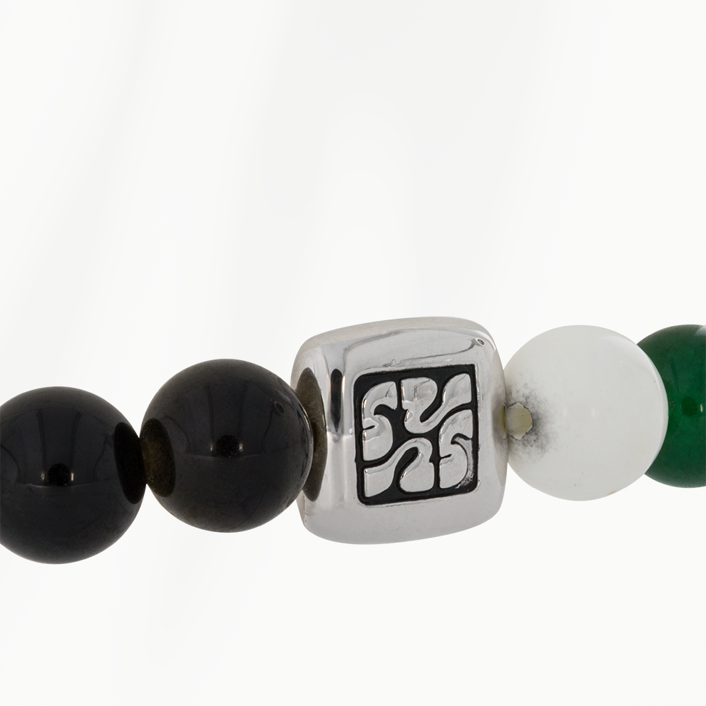 Close-up van metalen tussenstuk met gegraveerd logo van Elements heren armband Grounded Mix