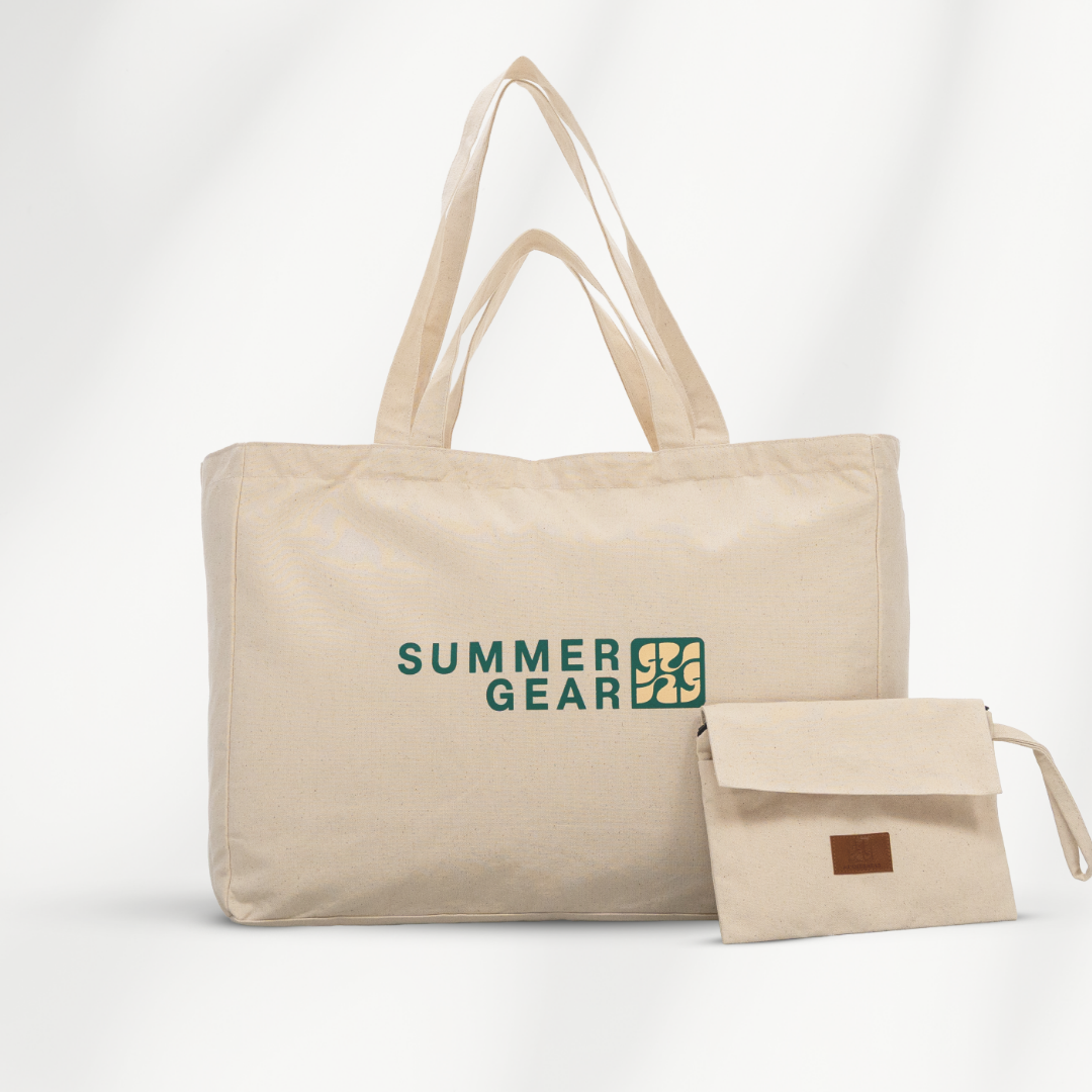 Grote strandtas XL met 2 handvaten die volledig afsuit met rits van  canvas in de kleur naturel en gratis clutch