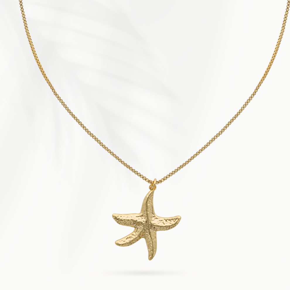 Goudvergulde damesketting Star van SummerGear met goudkleurige zeesterhanger en fijne schakelketting op witte achtergrond Kopiëren