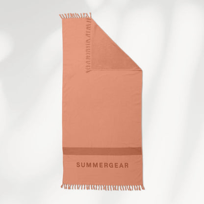 Roze hamamdoek van biologisch katoen van SummerGear met badstof achterkant detail