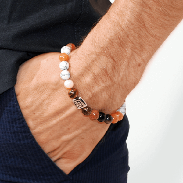 SummerGear Soft Stone kralenarmband voor heren met oranje en wit gemarmerde kralen, gedragen om de pols